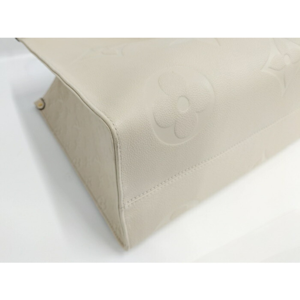 Louis Vuitton Onthego Empreinte Shoulder Bag Beige - Picture 4 of 10